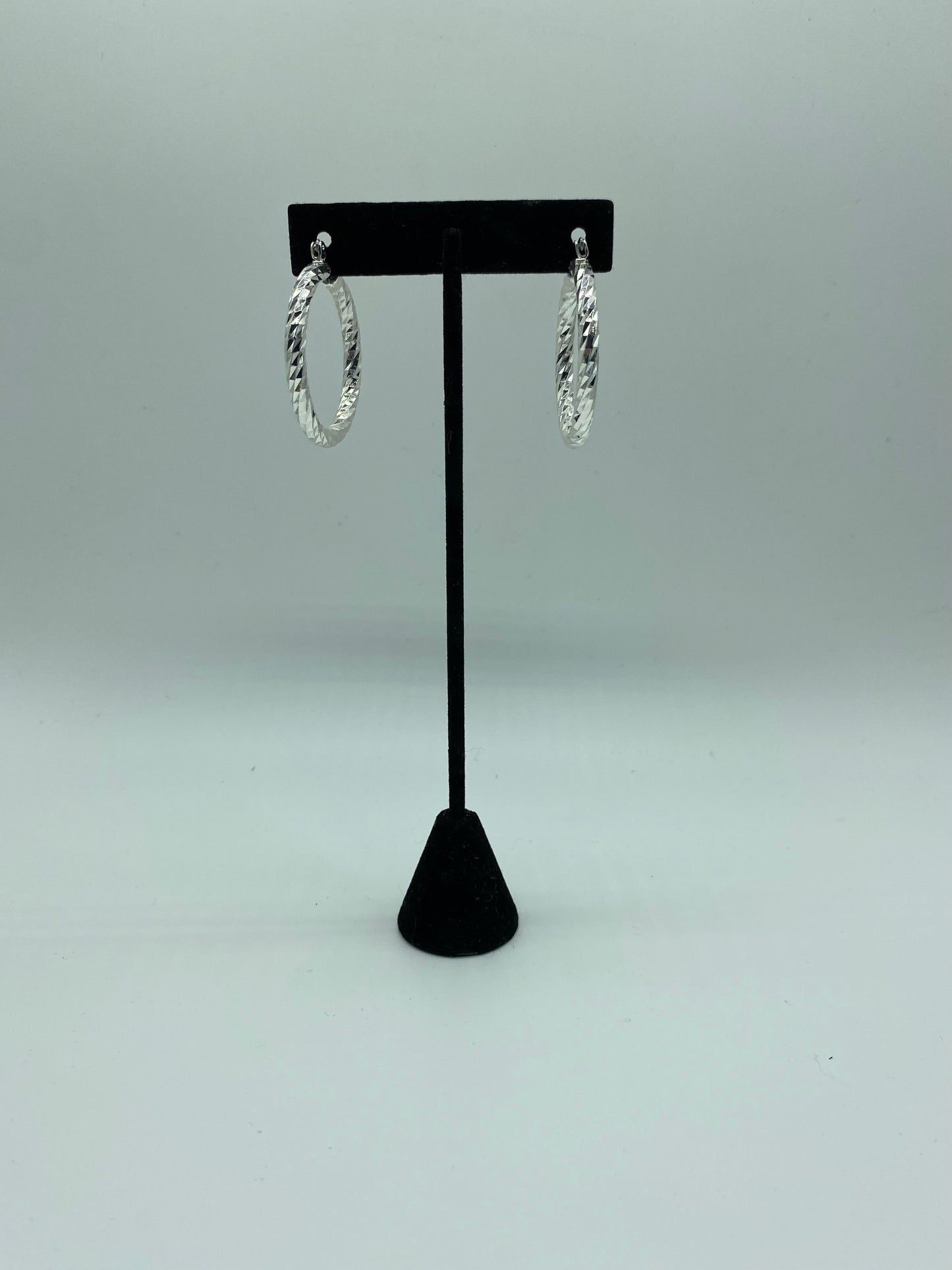 Swirl hoop earrings