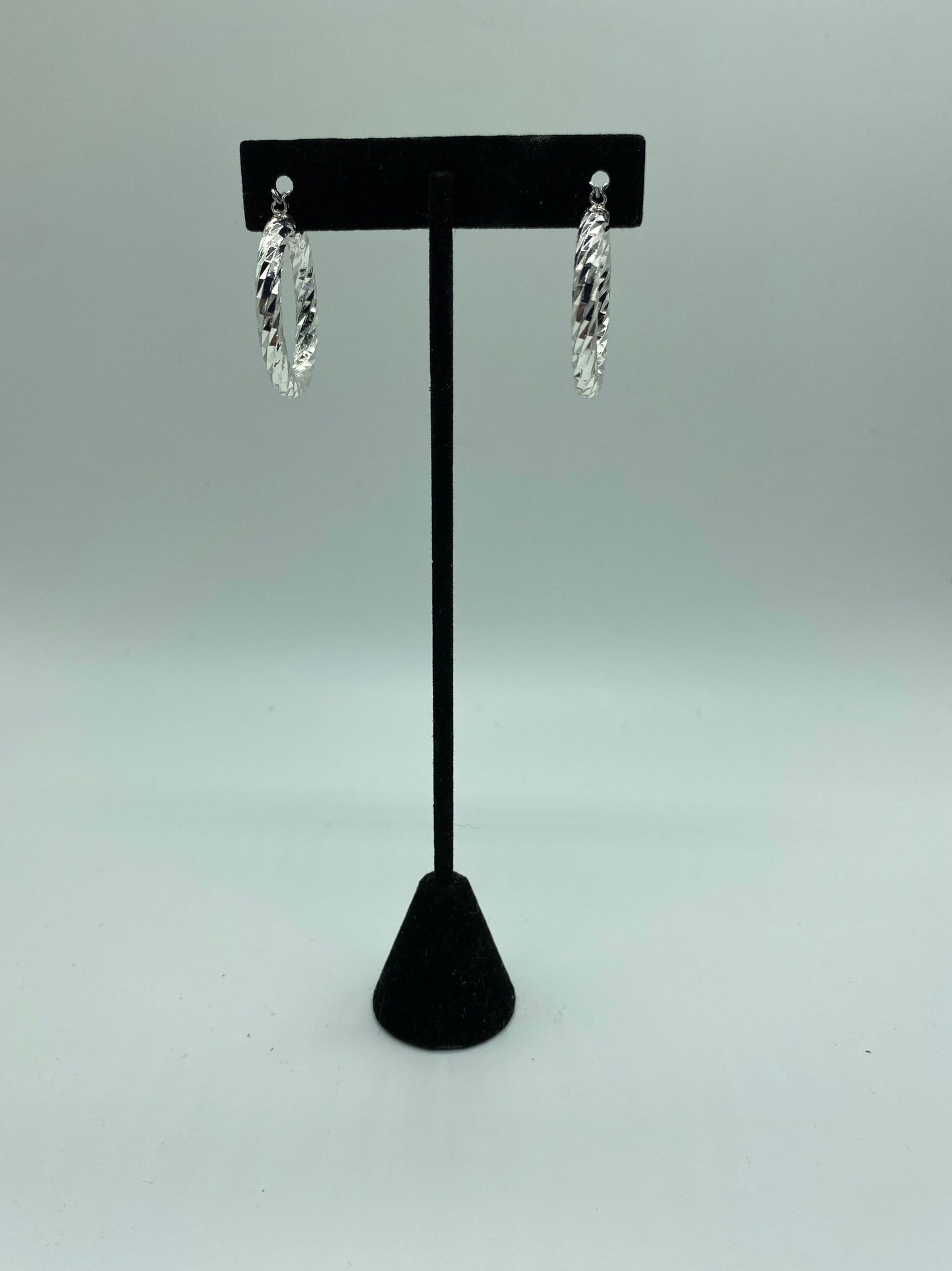 Swirl hoop earrings