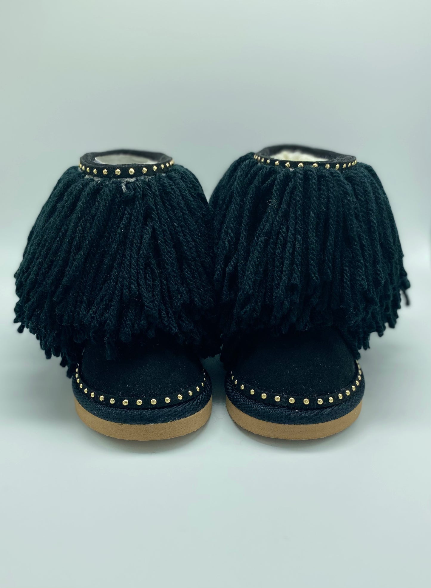 Black shaggy boots