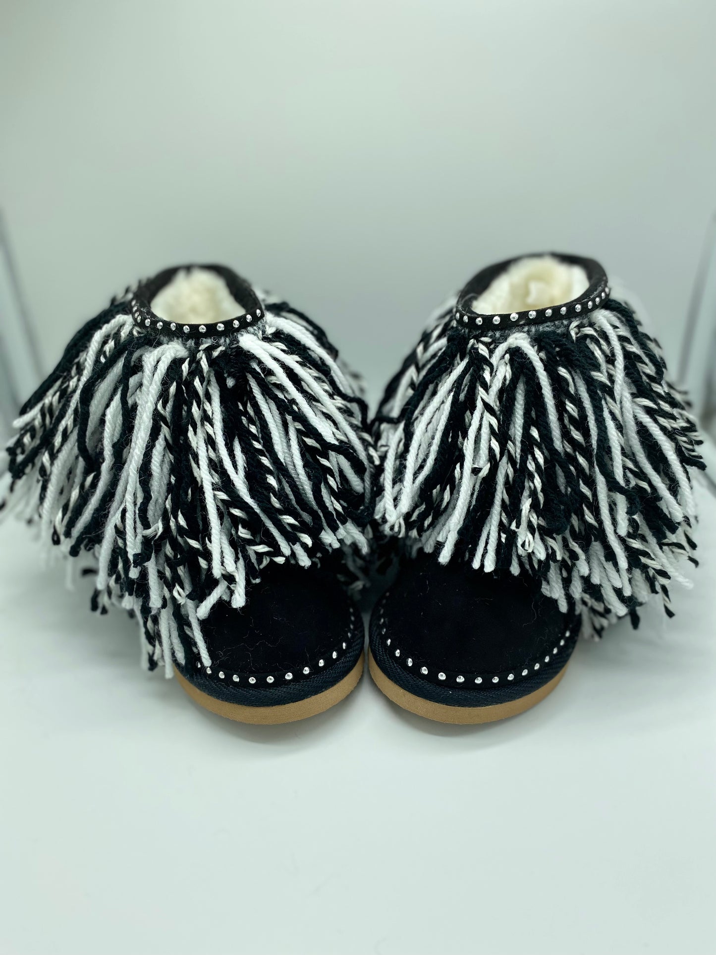 Cookie and Cream shaggy boots